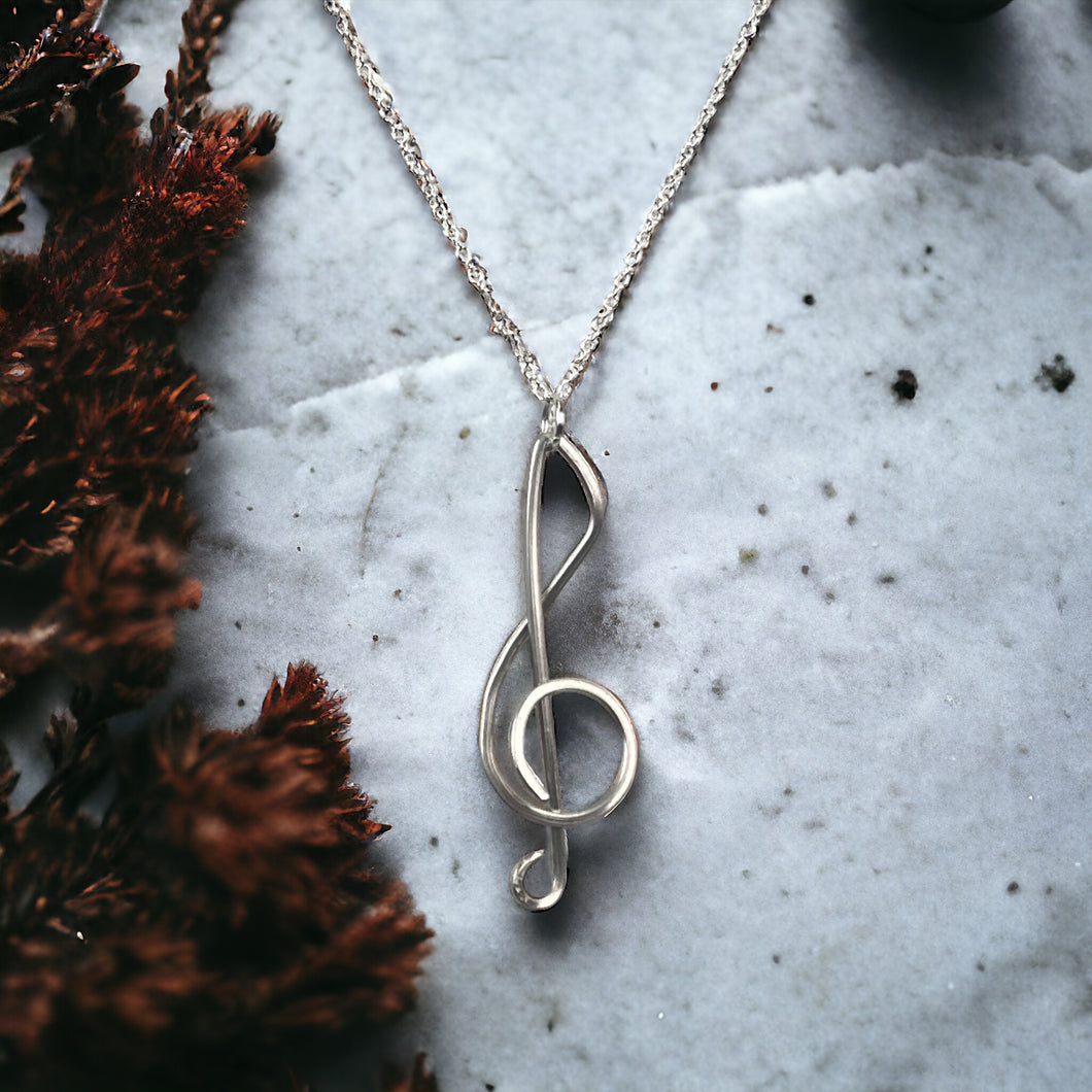 Silverplate fork tine treble clef pendant necklace